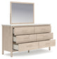 Cadmori Queen Upholstered Panel Bed with Mirrored Dresser and Nightstand