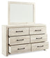 Cambeck King Upholstered Panel Bed with Mirrored Dresser, Chest and Nightstand